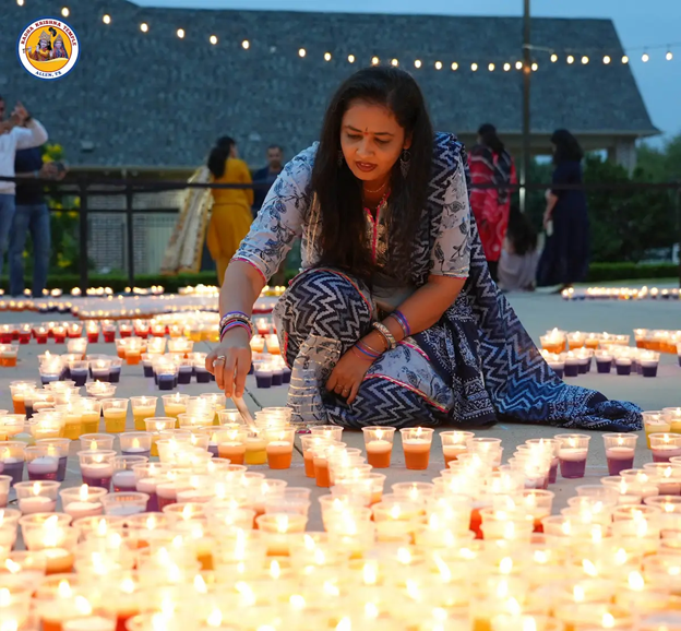 A person sitting on the ground with many candles

AI-generated content may be incorrect.