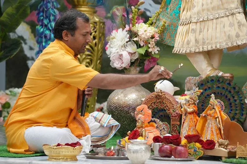Priest performing Puja at Radha Krishna Temple of Dallas