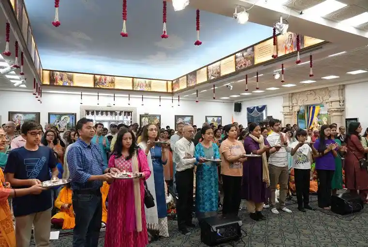 Aarti and prayer offer light and devotion, invoking peace, gratitude, and divine blessings.