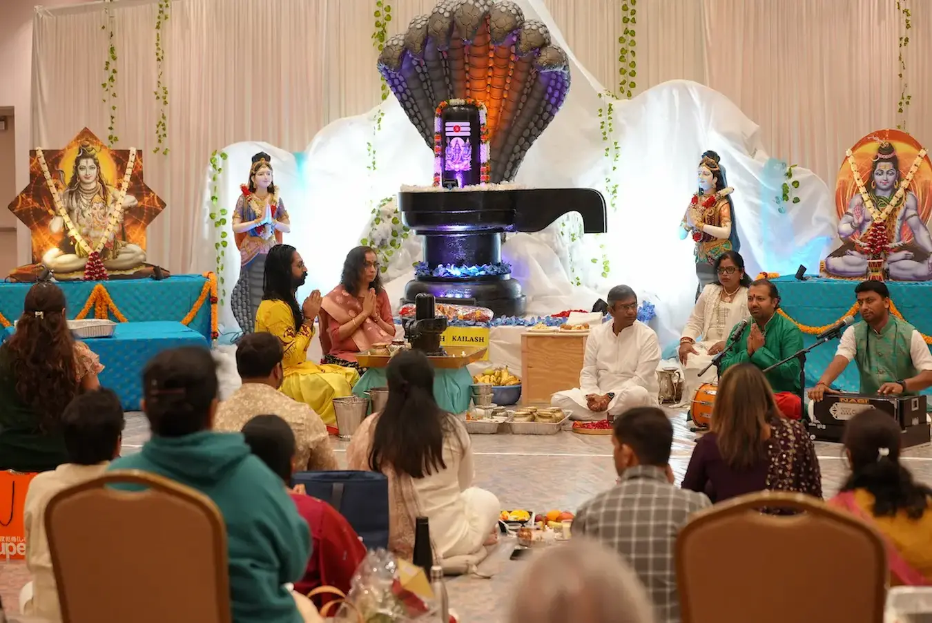 Magnificent 20-foot Shivling decorated for sacred Maha Shivratri rituals.