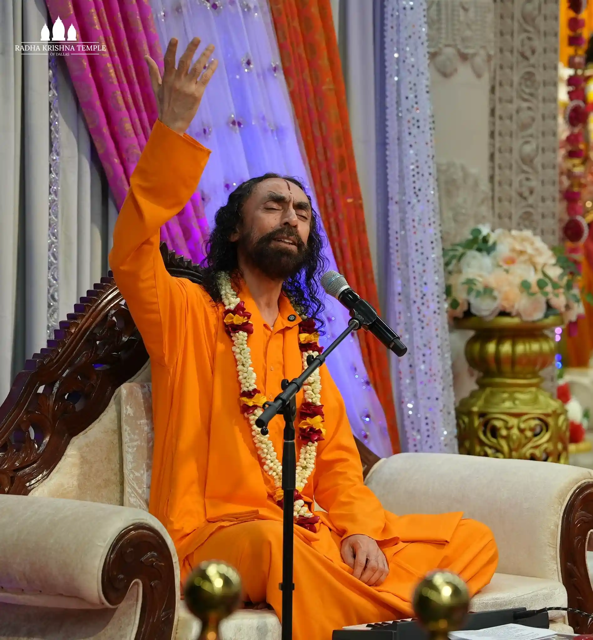 Saint and Founder, Swami Mukundanandaji, joyfully singing a kirtan at Radha Krishna Temple of Dallas