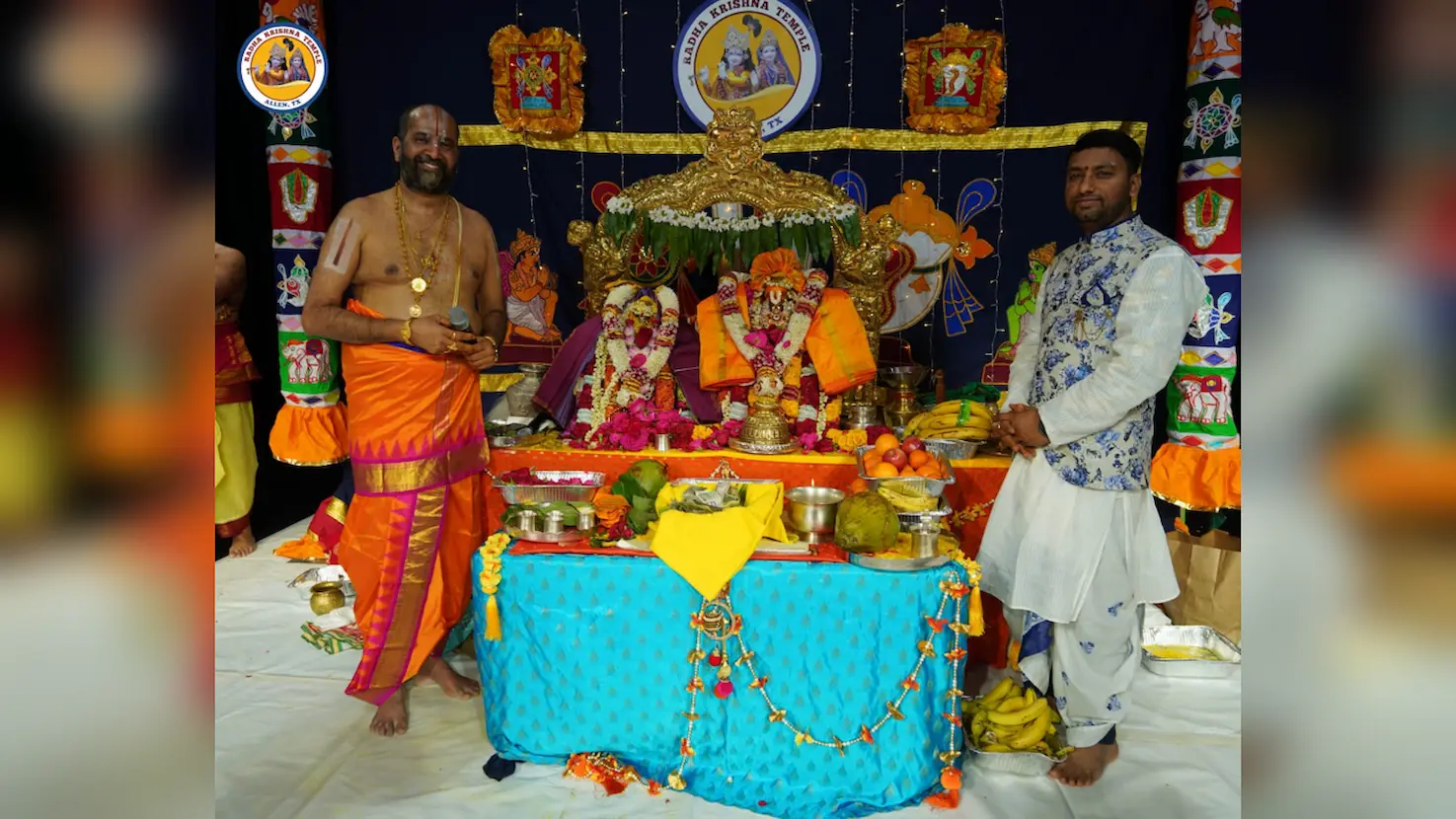 Priests and devotees standing beside a decorated altar with Lord Venkateswara and Padmavati during a traditional Srinivasa Kalyanam ceremony.