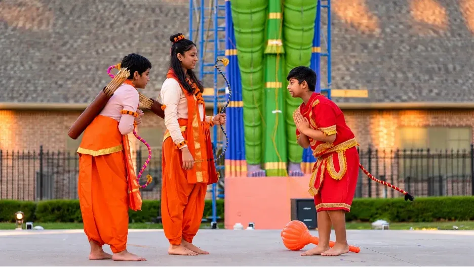 Children perform a Ramayan-inspired cultural presentation during a Dussehra celebration, portraying the values of devotion, courage, and dharma